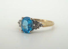 Ladies 9CT Yellow Gold Ring Featuring Blue Stone (Size S) - AD 500457
