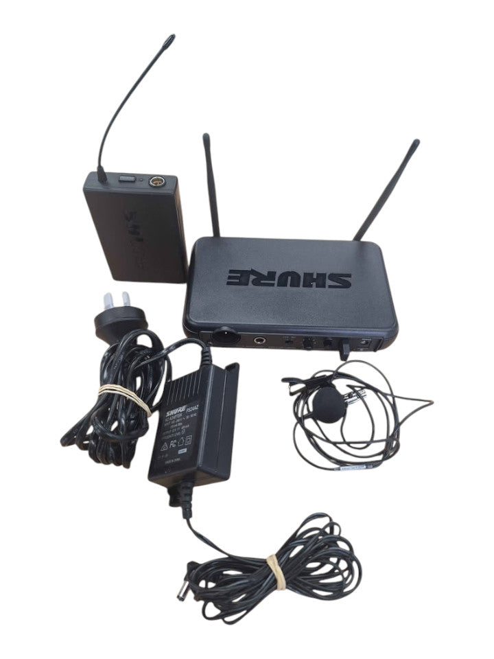 SHURE SVX4 WIRELESS MICROPHONE RECIEVER WITH ACCESSORIES. 508897