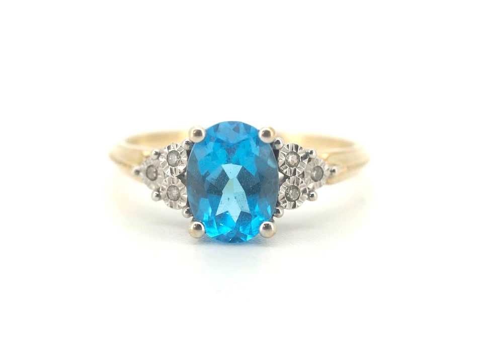 Ladies 9CT Yellow Gold Ring Featuring Blue Stone (Size S) - AD 500457