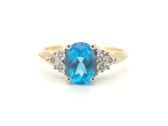 Ladies 9CT Yellow Gold Ring Featuring Blue Stone (Size S) - AD 500457